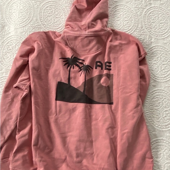 American Eagle Outfitters Pink Hoodie with Black Palm Tree Design - Picture 2 of 3